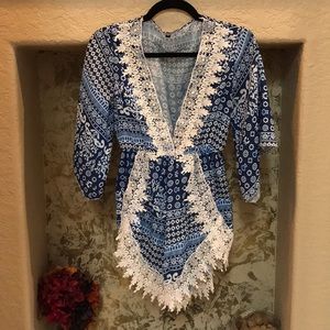 Blue romper with white lace